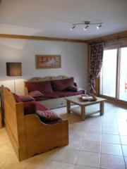 Appt. Gentiane - The living room and doors to balcony