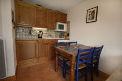 Appt. du Refuge - The kitchen and dining area