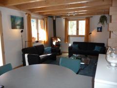 Chalet Les Buissons - The living room and built in log burner