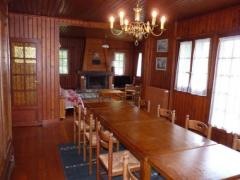 Chalet Capricorne - The dining room through to lounge
