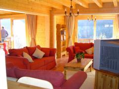 Chalet Chamois - The living room with doors to balcony