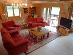 Chalet des Champs - The lounge area and doors to terrace