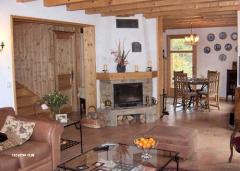 Chalet Le Charnier - The sitting room and built in fire