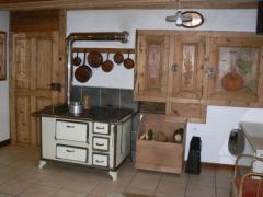 Ferme La Cherrire - The wood burning range in the living room