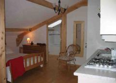 Chalet du Coin - First floor bedroom with living/kitchen/bathroom