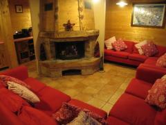 Chalet Boucherie - Sitting area with open fire
