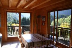 Chalet La Perriere - Dining area with doors to balcony