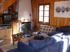 Chalet le Roc - Living room with fire (ground floor)