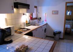 Appt. Les Crets - The kitchen (with bedroom beyond)