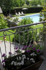 Maison Thusy - View of the pool from the balcony