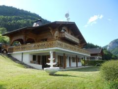 Chalet Quatre Saisons - The chalet and garden