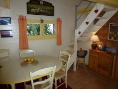 Chalet Les Quatre Vents - Dining area and stairs to bedroom 2