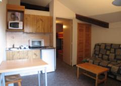 Appt. Soleil Blanc - Living room/kitchenette