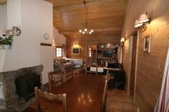 Chalet Tounet - The dining area and fireplace