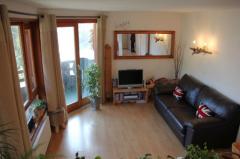 Appt. Tovachire - The living room and doors to balcony