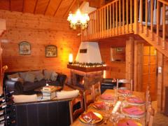 Chalet Lac de Vonnes - The living room showing the fireplace